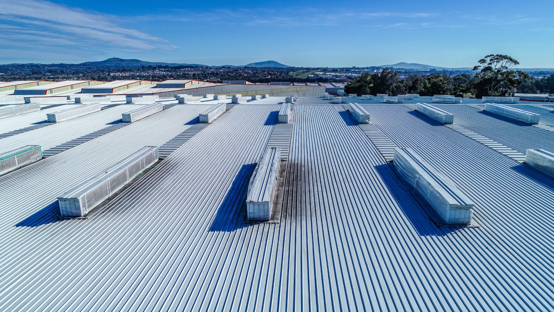 Thermal drone conducting building inspection